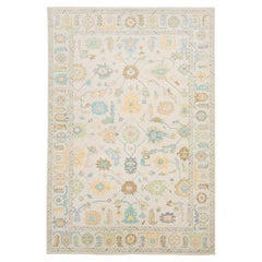 Modern Oushak Style Wool Area Rug in Soft Pastel Ivory, Sage, and Mineral Blue