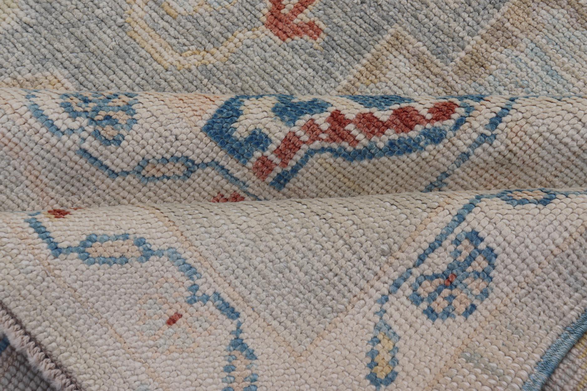Modern Oushak Turkish Rug with All Over Design in Light Blue, Ivory, & Red For Sale 8
