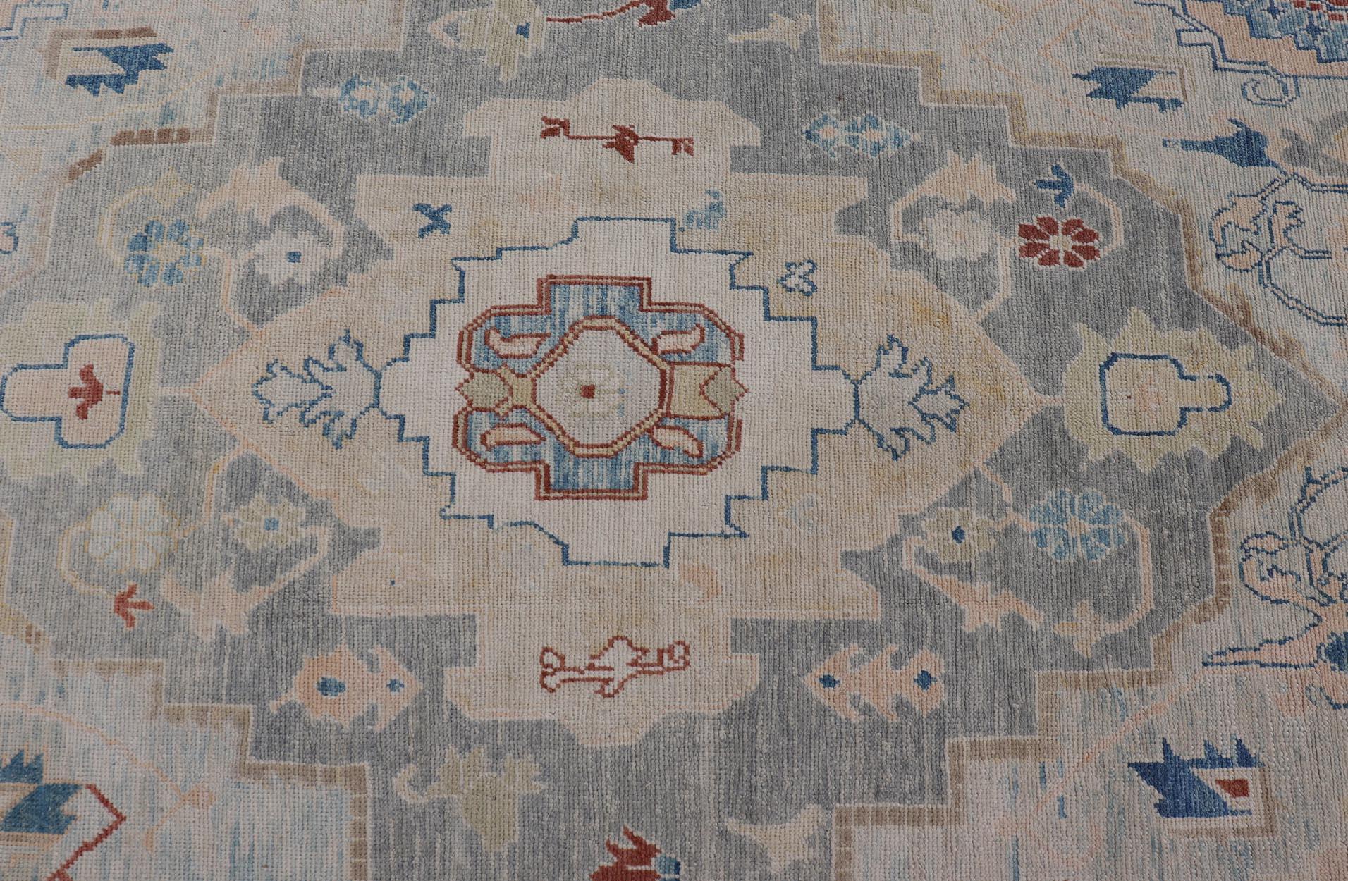 Contemporary Modern Oushak Turkish Rug with All Over Design in Light Blue, Ivory, & Red For Sale