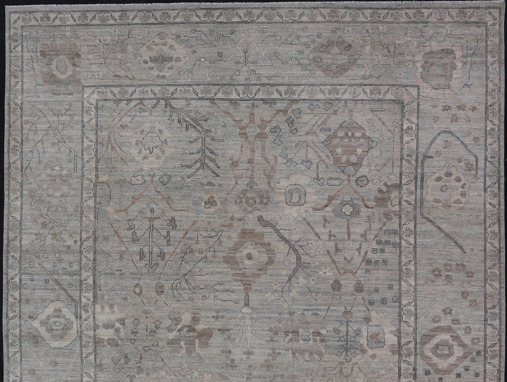 Modern Oushak Rug in Light Color Background with All-Over Tribal Motifs For Sale 1