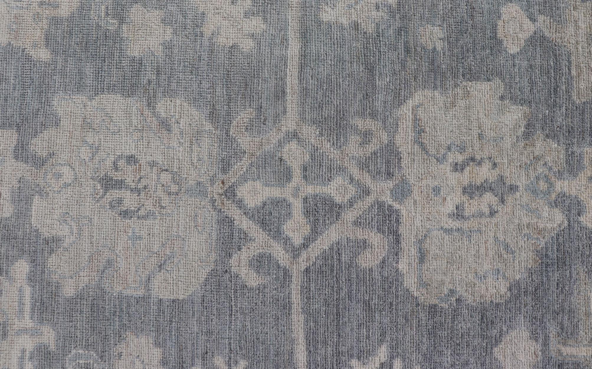 Hand-Knotted Modern Oushak with Large Floral Motifs with Cream, Blue, and Steel Blue For Sale