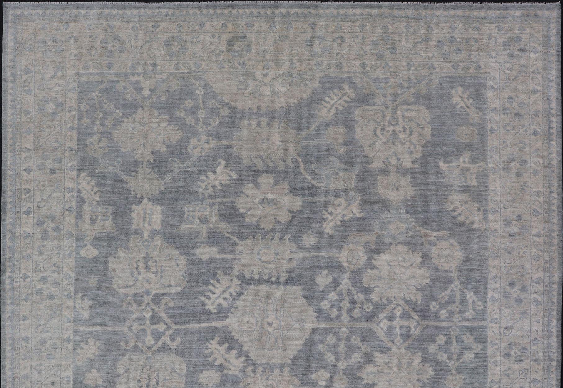 Contemporary Modern Oushak with Large Floral Motifs with Cream, Blue, and Steel Blue For Sale