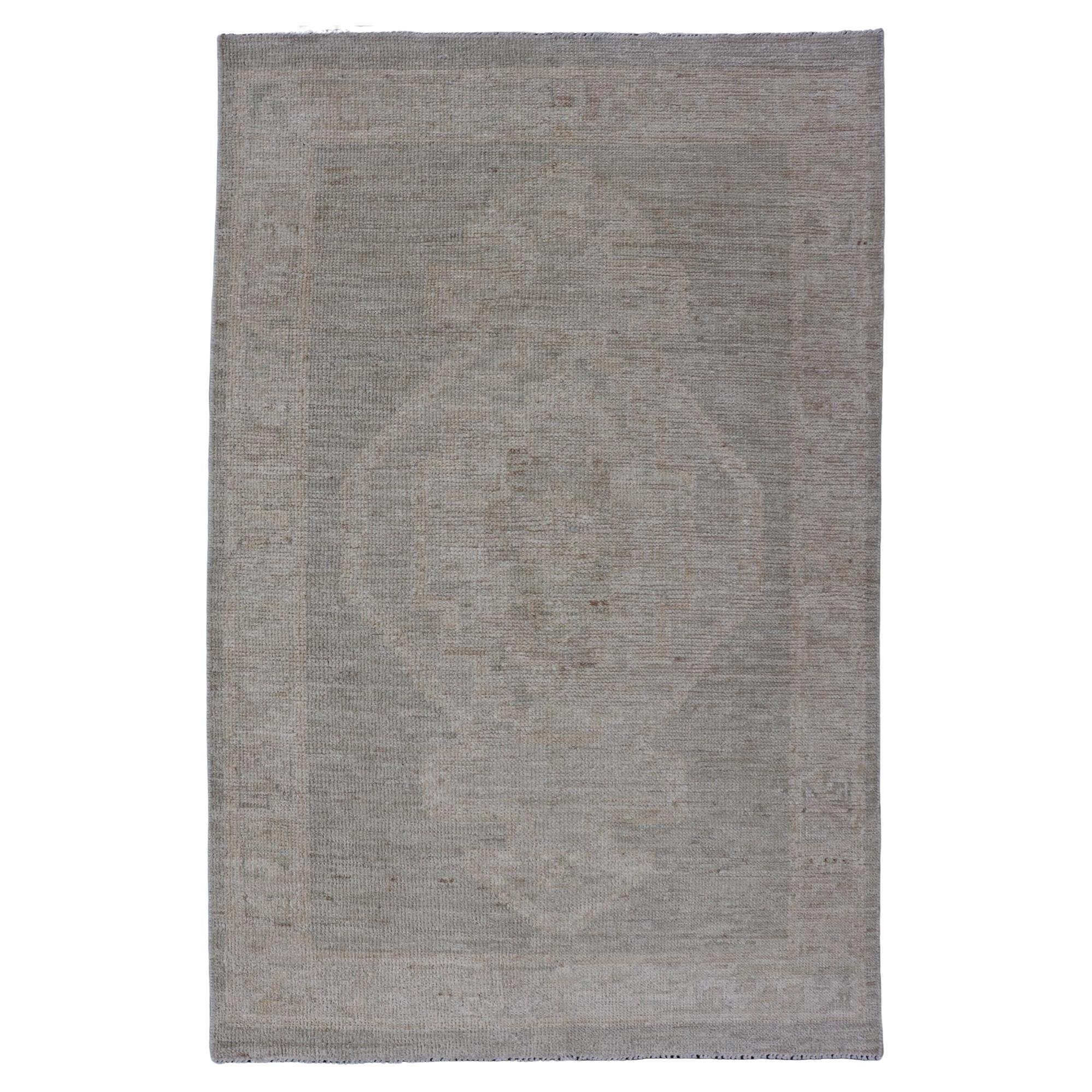 Modern Oushak with Off Gray Background with A Large Tribal Medallion in Cream