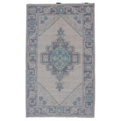 Modern Oushak with Off White Background with A Large Tribal Medallion in Teal 