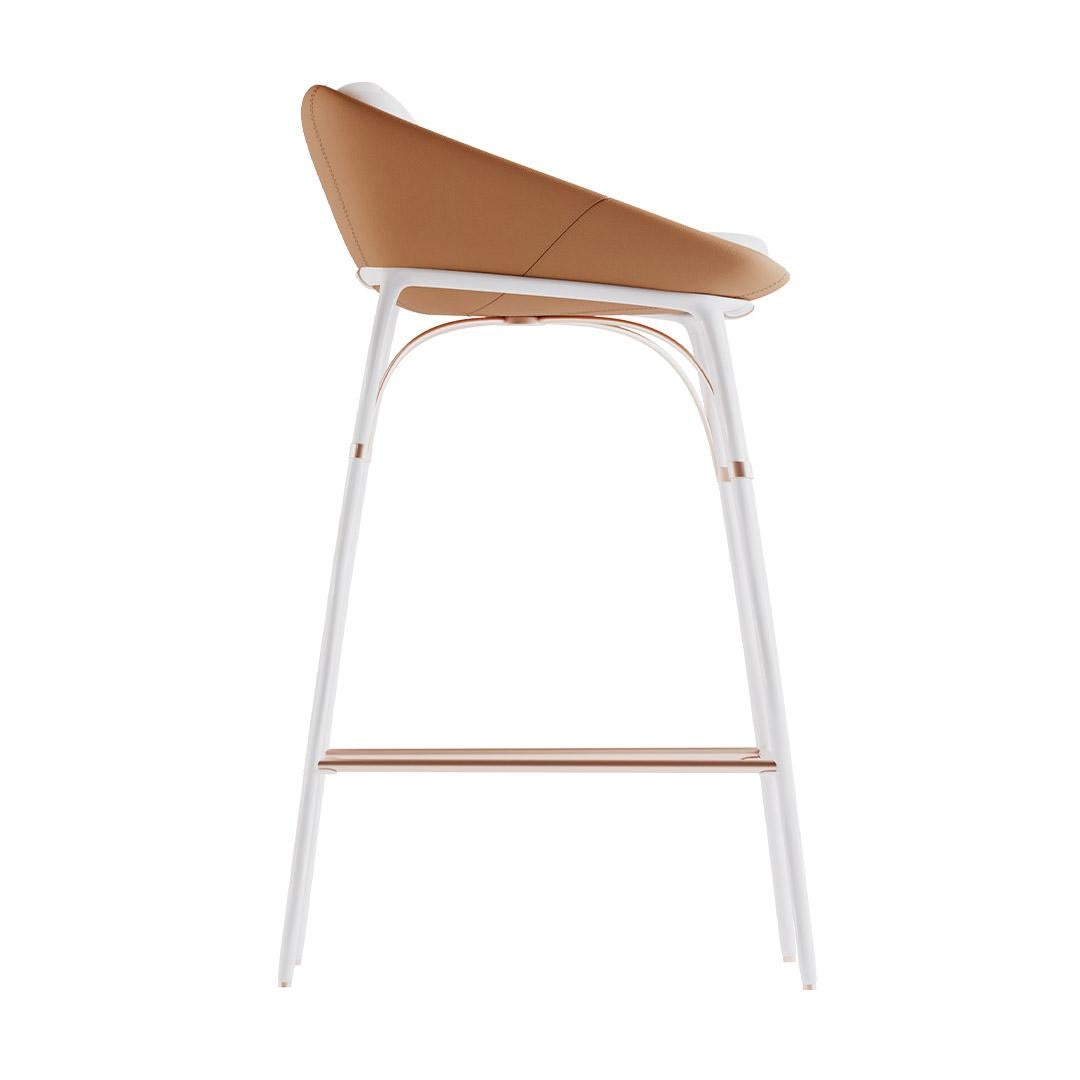 Nero, bar chair

Contemporary outdoor dining chair made with structure: Legs white matte powder coated stainless steel, metallic details in copper-plated stainless steel, Upholstery: Acrylic fabric and synthetic outdoor leather

The Nero bar chair