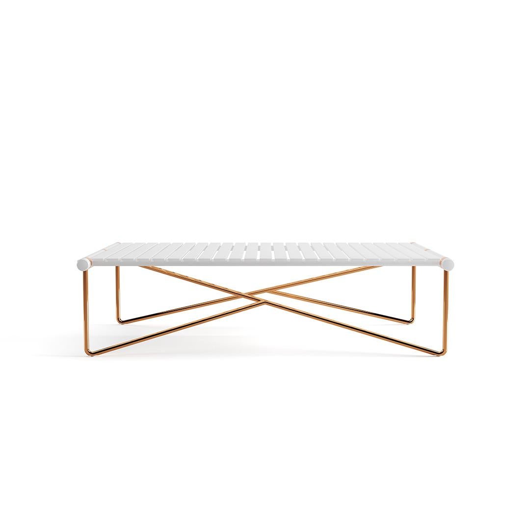 The whole design of this sophisticated outdoor center table was developed according to the following structure: 
-Top: White matte lacquered aluminum and stainless steel;
-Legs: Gold plated stainless steel;
-Details: Gold-plated stainless