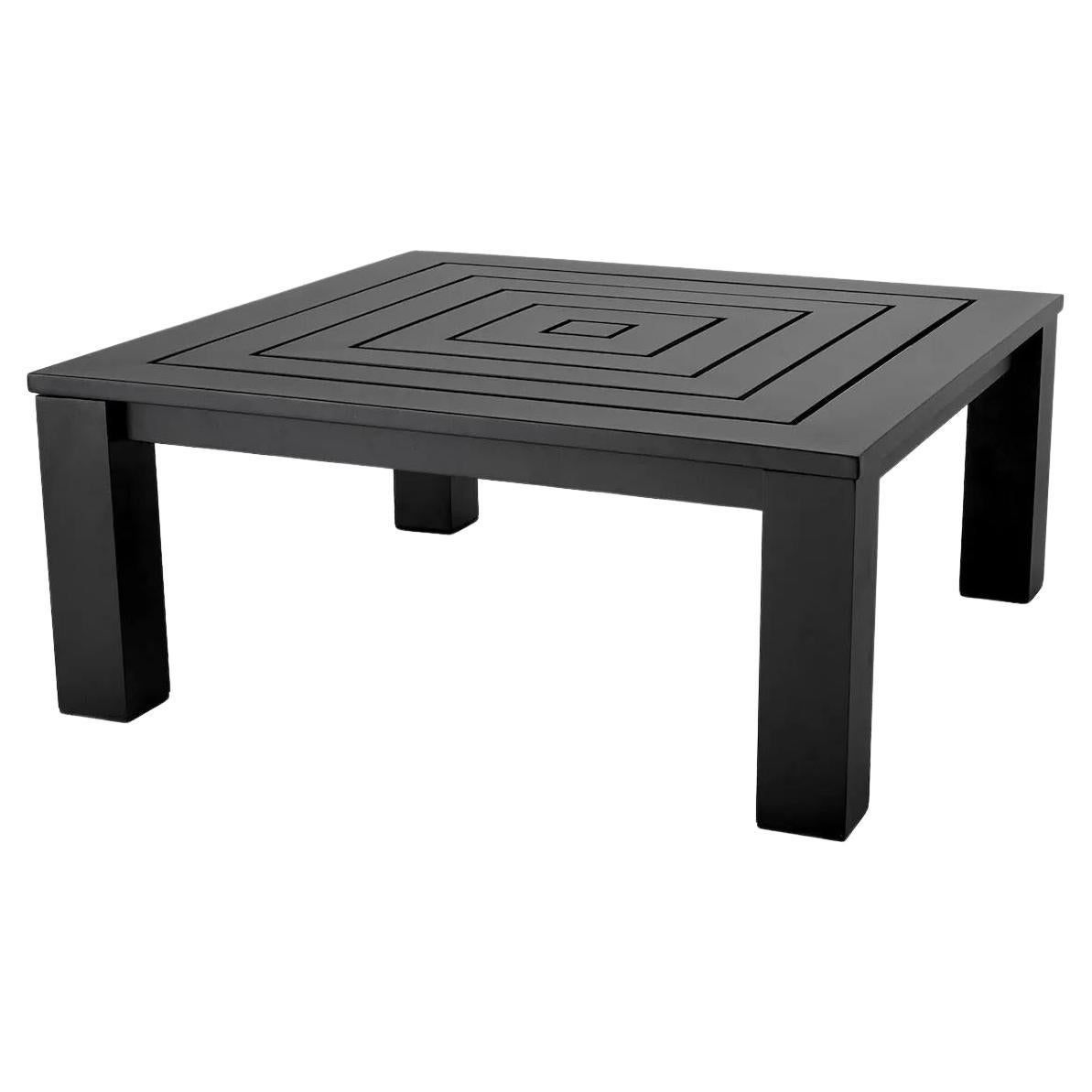 Table basse moderne d'extérieur avec finition noire.