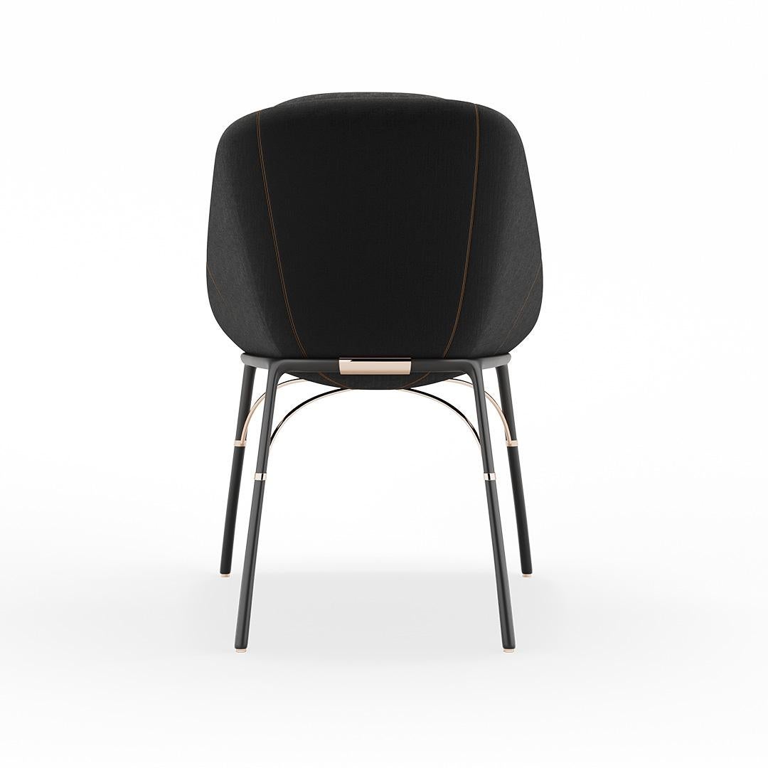 Nero - Chaise de salle à manger

Le fauteuil de salle à manger Nero incarne l'élégance moderne, avec ses lignes épurées et sa forme sculptée. Conçue de manière réfléchie avec des lignes raffinées et des matériaux de première qualité, cette chaise