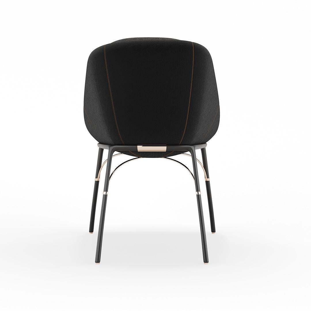 Nero - Dining chair

Contemporary outdoor dining chair made with structure: Legs black matte powder coated stainless steel, Metallic details in gold plated stainless steel, Upholstery: Acrylic fabric and synthetic outdoor leather

Nero Collection