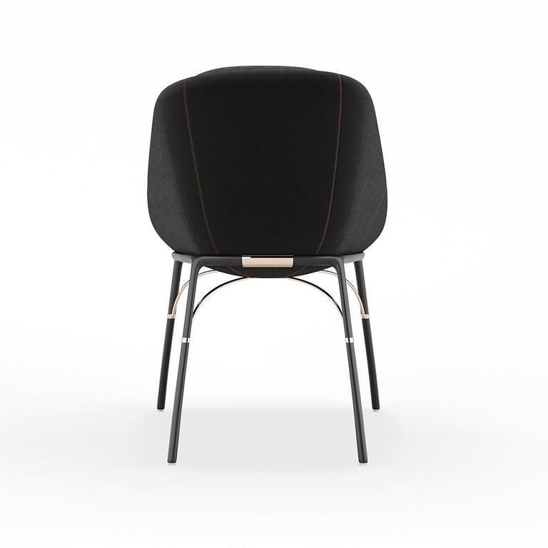 Nero - Dining chair

Contemporary outdoor dining chair made with structure: Legs black matte lacquered stainless steel, Metallic details in gold plated stainless steel, Upholstery: Acrylic fabric and synthetic outdoor leather

Nero Collection