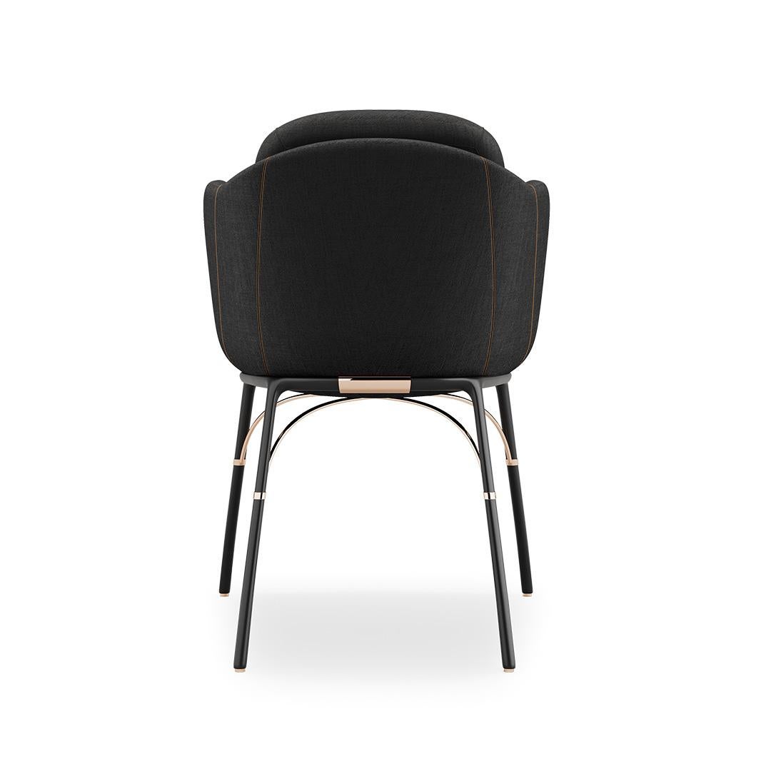 Nero, dining chair

Contemporary outdoor dining chair made with structure: Legs black matte lacquered stainless steel, metallic details in gold plated stainless steel, Upholstery: Acrylic fabric and outdoor leather

Nero Collection found its appeal