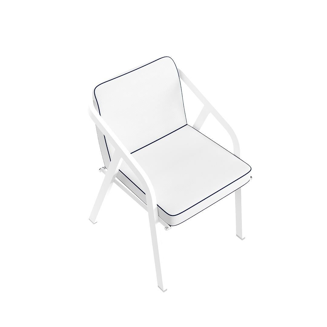 Ribbon - Outdoor dining chair 

Contemporary outdoor dining chair made with structure: White lacquered aluminum, Metallic details: Nickel-plated, Upholstery: Acrylic fabric, Pipping: Outdoor synthetic leather, Straps: Outdoor synthetic Leather

Due