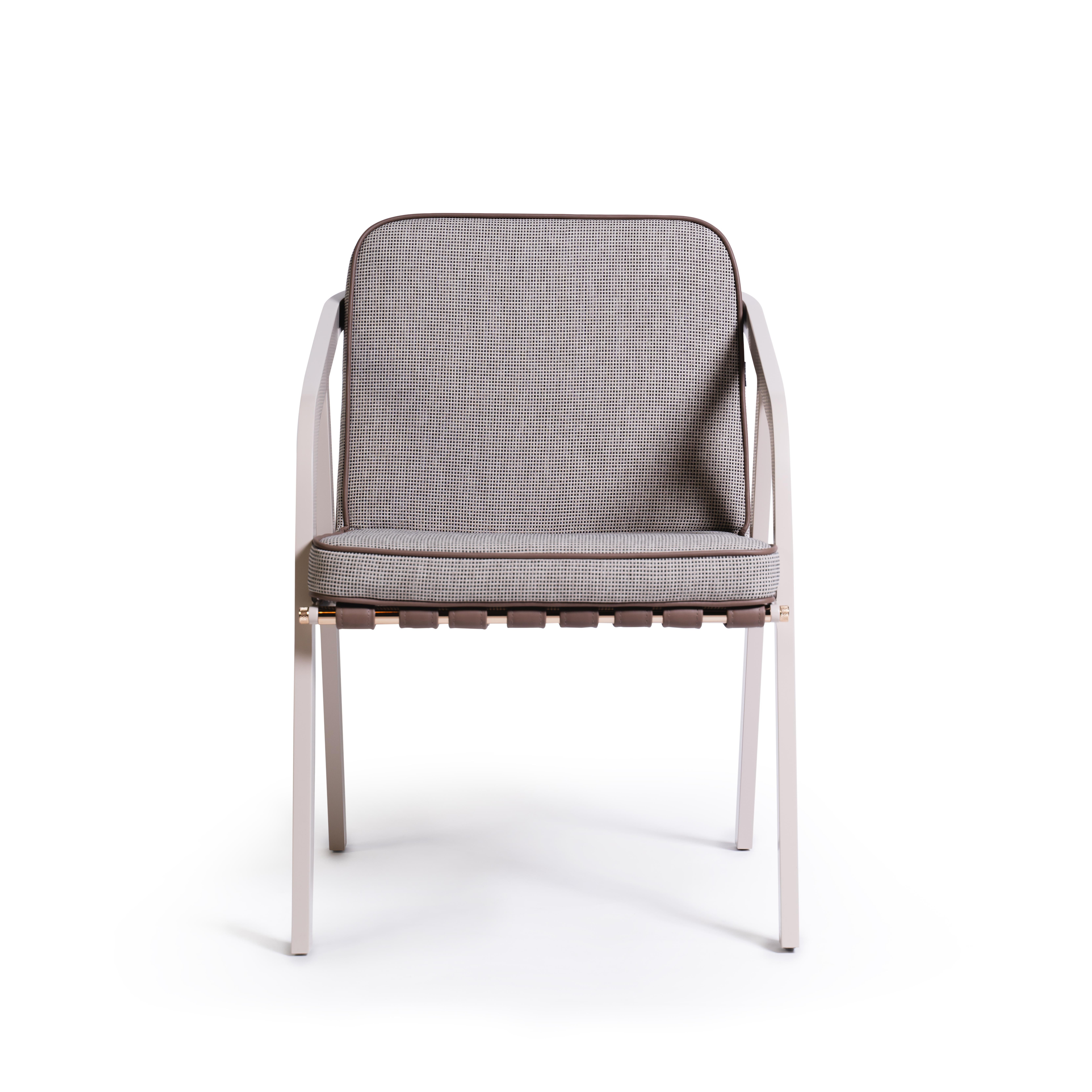 Ribbon - Outdoor dining chair 
Contemporary outdoor dining chair made with structure: White lacquered aluminum, Metallic details: Nickel-plated, Upholstery: Acrylic fabric, Pipping: Outdoor synthetic leather, Straps: Outdoor Synthetic Leather

Due