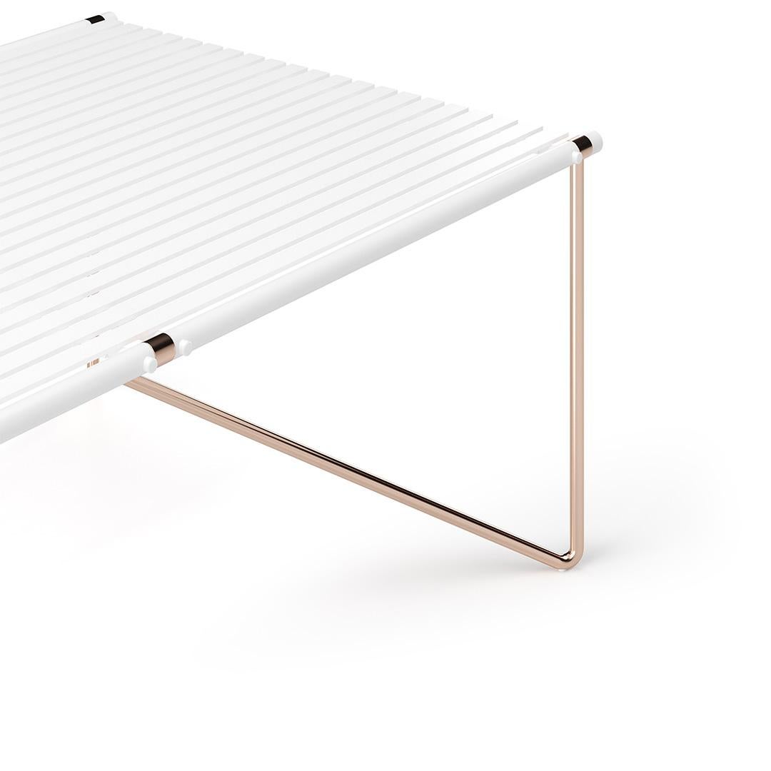 NOA, outdoor dining table

Contemporary outdoor dining table made with top: white matte lacquered aluminum and stainless steel, legs: copper plated stainless steel, details: copper plated stainless steel

The Noa dining table carries Myface's