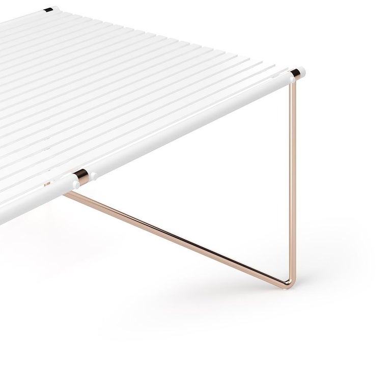 NOA, outdoor dining table

Contemporary outdoor dining table made with top: white matte lacquered aluminum and stainless steel, legs: copper plated stainless steel, details: copper plated stainless steel

The Noa dining table carries Myface's