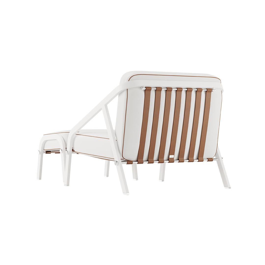 Ribbon - Outdoor lounge armchair 

Contemporary outdoor lounge armchair made with structure: White powder-coated aluminum, Metallic details: Nickel-plated, Upholstery: Acrylic fabric, Pipping: Outdoor synthetic leather, Straps: Outdoor Synthetic