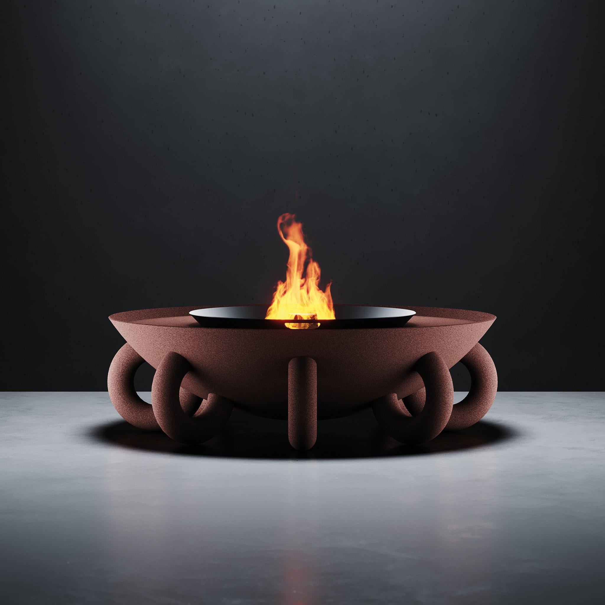Kalam Fire Pit ist eine freistehende, moderne Feuerstelle, die perfekt in ein modernes Outdoor-Design-Projekt passt. Kalam schafft einen weiteren Ausdruck des Wohnens im Freien mit einem Design, das einem Kunstwerk ähnelt, das eine gemütliche