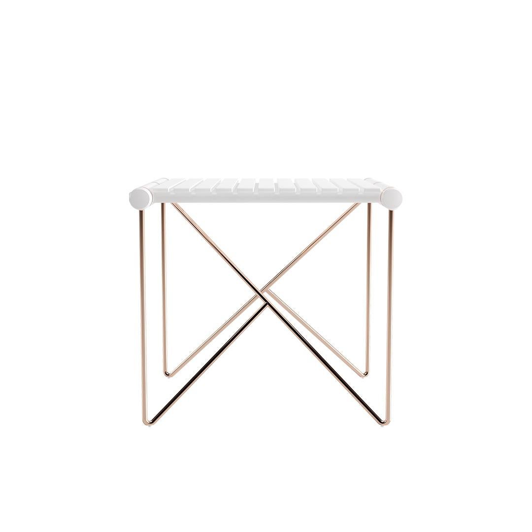 The whole design of this sophisticated outdoor side table was developed according to the following structure: 
-Top: White matte lacquered aluminum and stainless steel;
-Legs: Copper plated stainless steel;
-Details: Copper-plated stainless