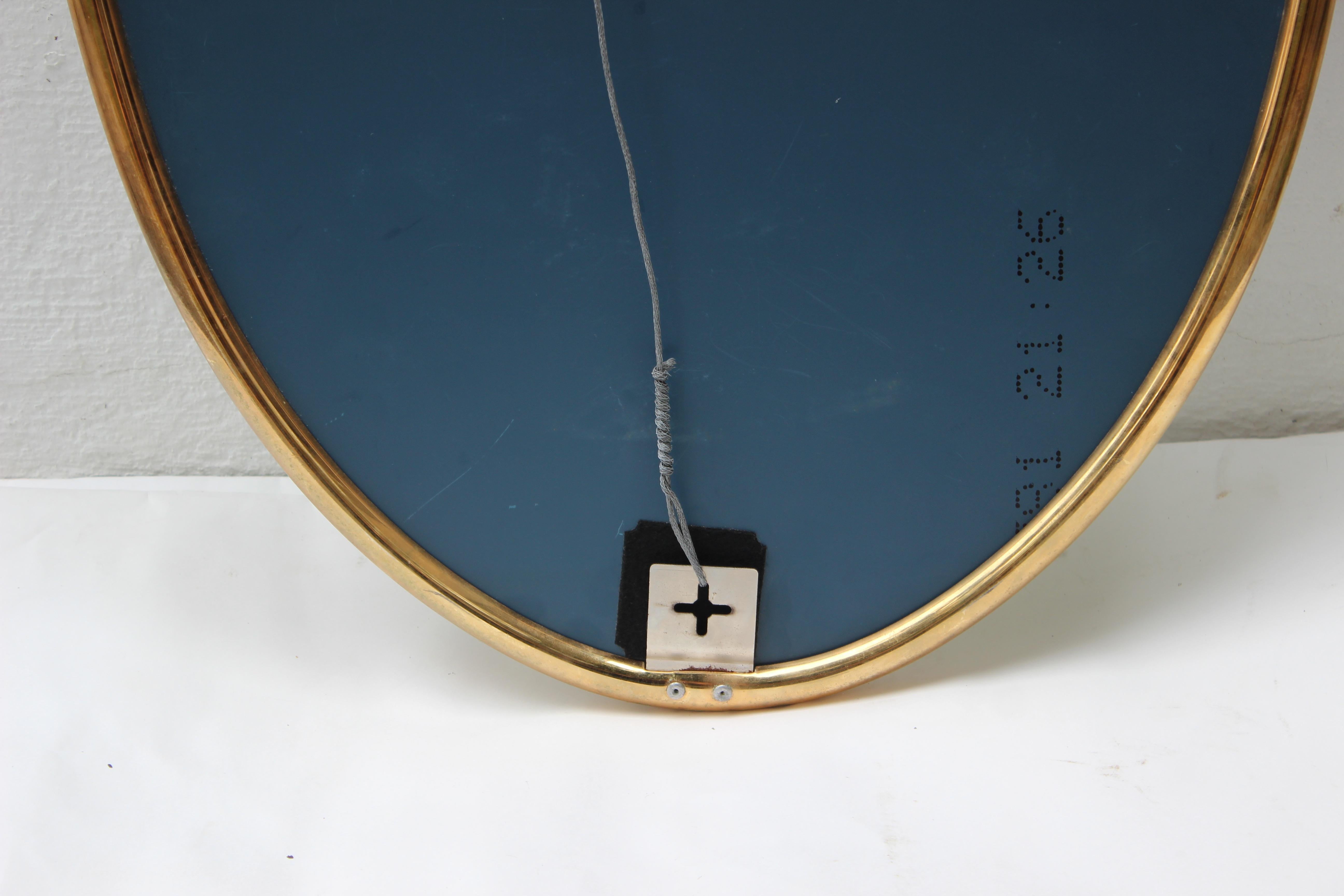 20th Century Modern Oval Brass Mirror
