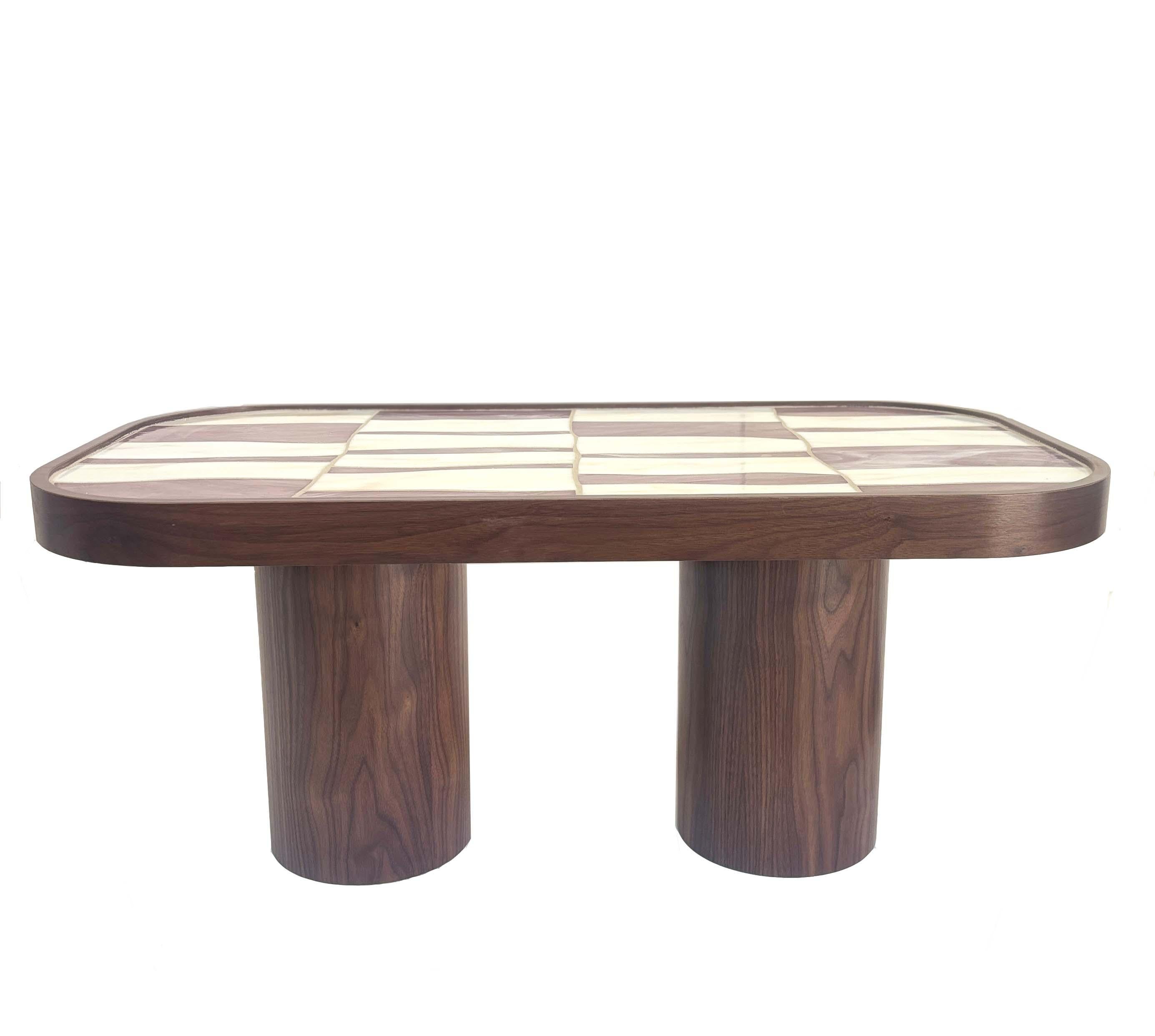 Palazzo oval coffee table with Ivory and Lavender glass sits on 2 Walnut Wood pedestals by Ercole Home. A sleek table with high craftsmanship and flowing mosaic patterns. Skillfully executed by Ercole's team of mosaic artists.

Part of the Palazzo
