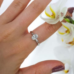 Modern Oval Diamond and Platinum Solitaire Ring, 0.91 Carats