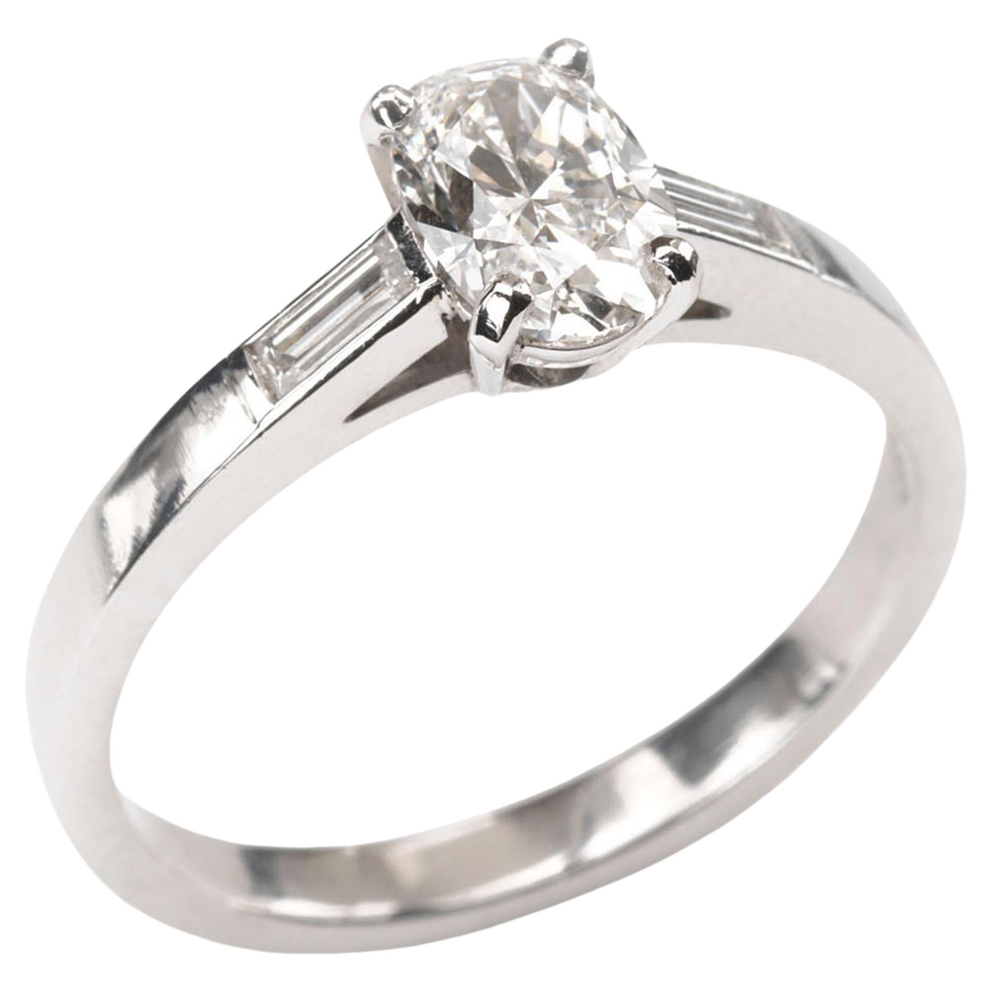 Modern Oval Diamond and Platinum Solitaire Ring 0.91 Carats For Sale