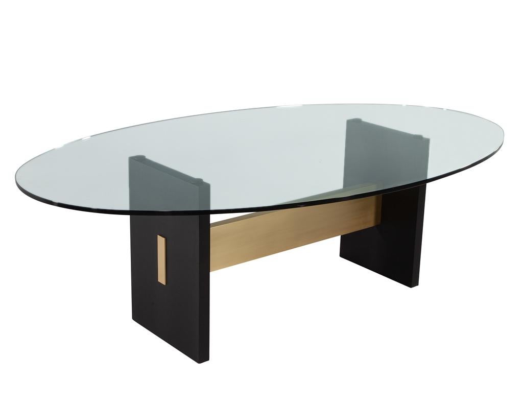 Canadian Modern Oval Glass Top Dining Table with Hand Crafted Metal Base For Sale