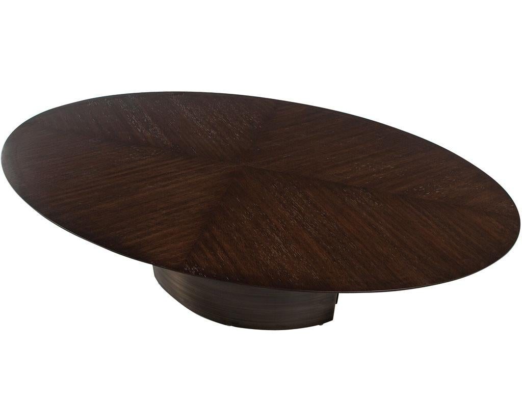 Modern Oval Oak Dining Table with Curved Metal Pedestals In Excellent Condition For Sale In North York, ON