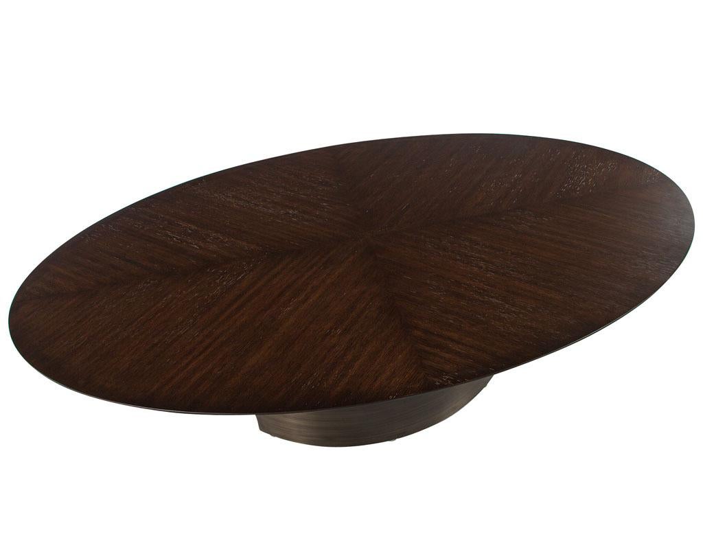 Contemporary Modern Oval Oak Dining Table with Curved Metal Pedestals For Sale