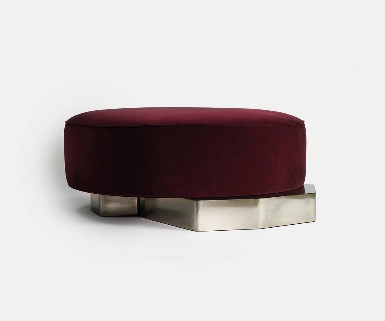 Flat POUF, 2018 is a Century 21st Collectible Modern luxury piece realised with a bordeaux cotton velvet and silver patinated brass base. Handcrafted details render this piece a sophisticated seating item ideal for the center of a foyer, or as a