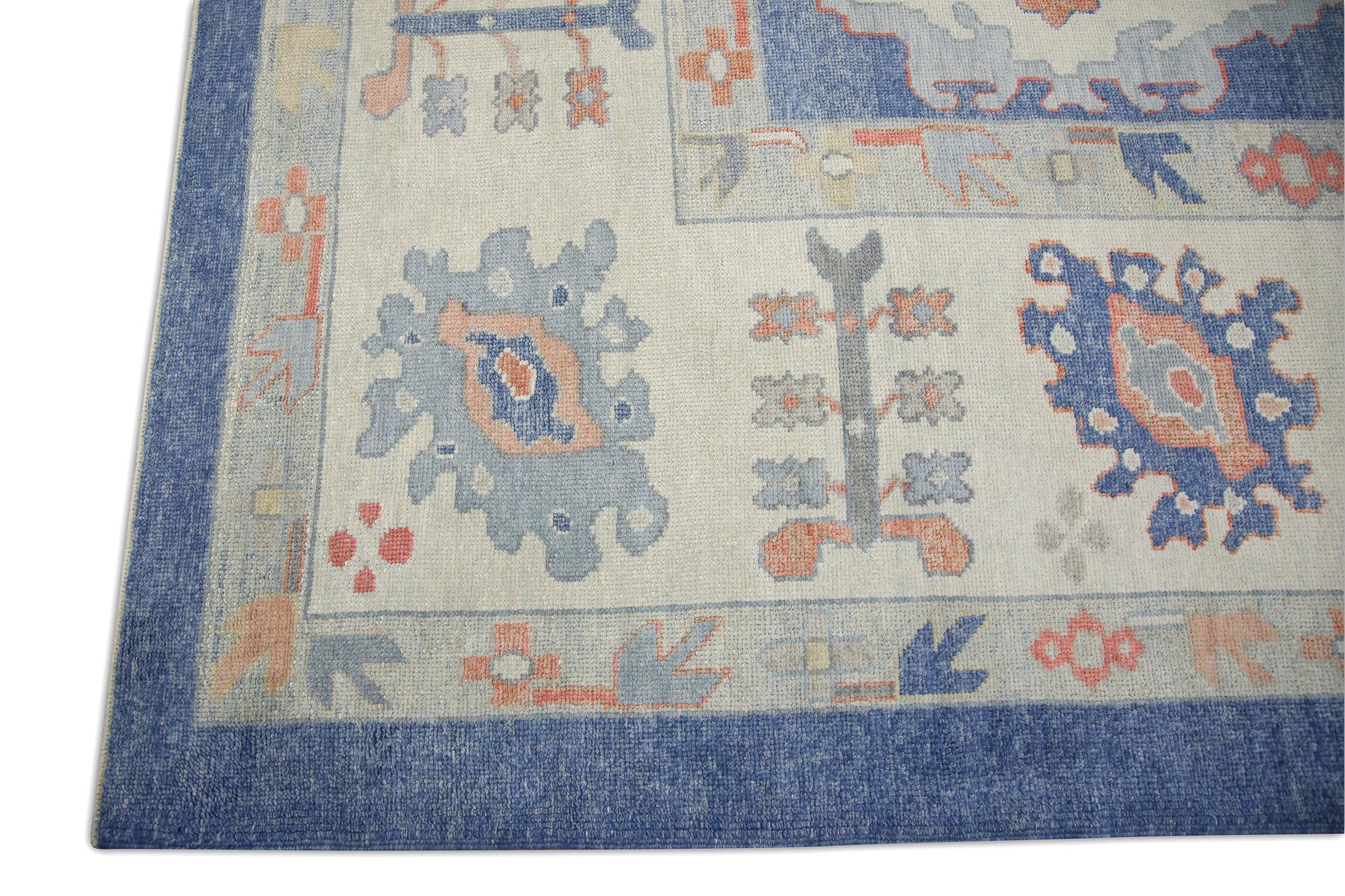 Türkischer Oushak-Teppich in Übergröße aus handgewebter Wolle in Blau & Rosa mit Blumenmuster 13'11