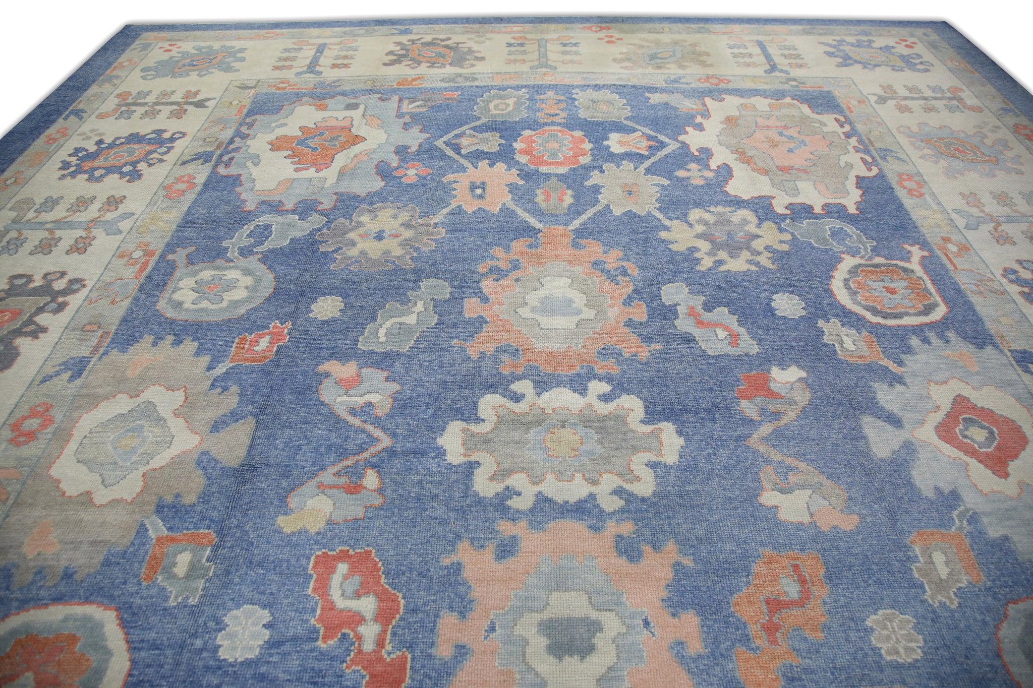 Türkischer Oushak-Teppich in Übergröße aus handgewebter Wolle in Blau & Rosa mit Blumenmuster 13'11