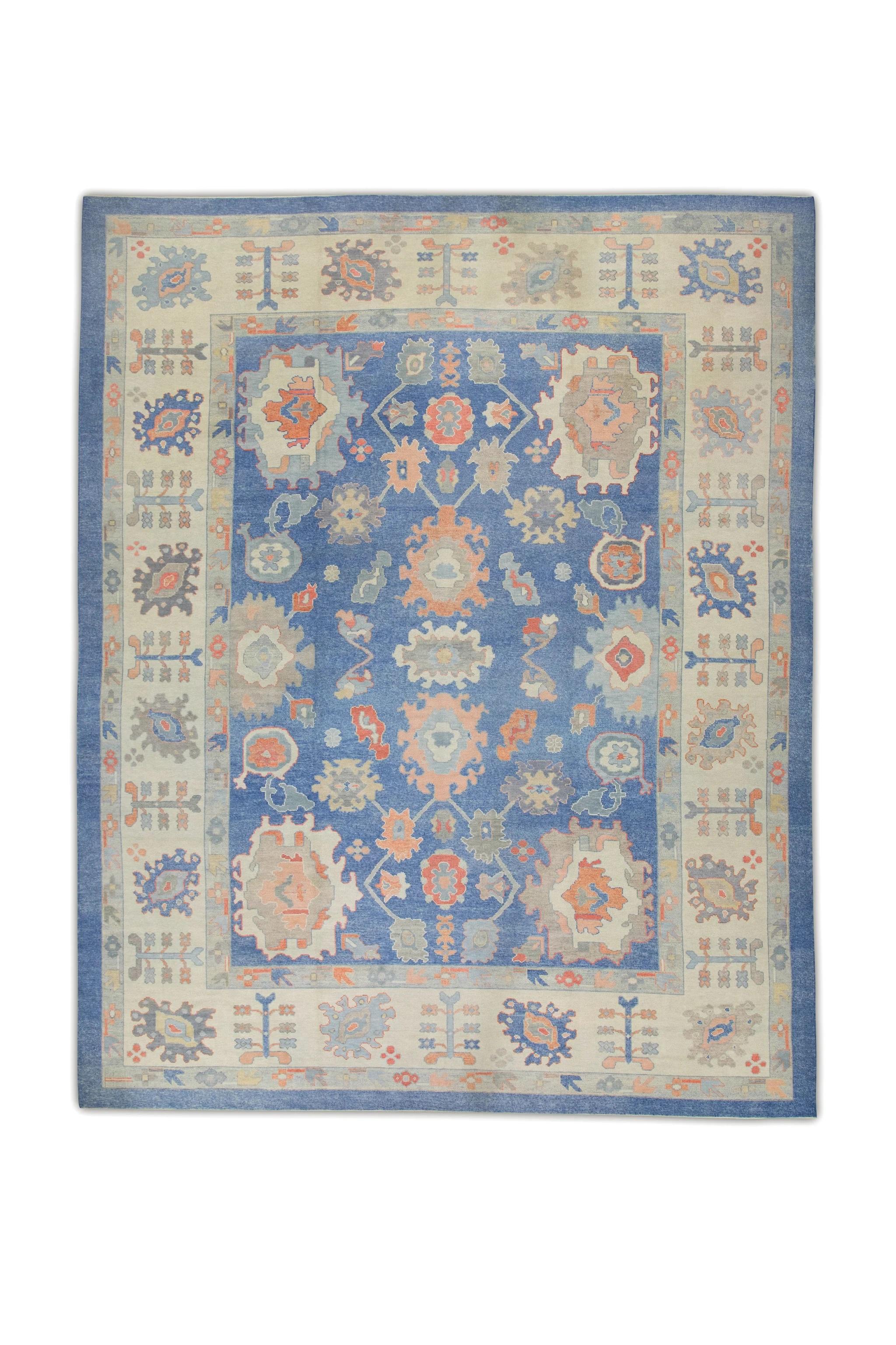 Türkischer Oushak-Teppich in Übergröße aus handgewebter Wolle in Blau & Rosa mit Blumenmuster 13'11