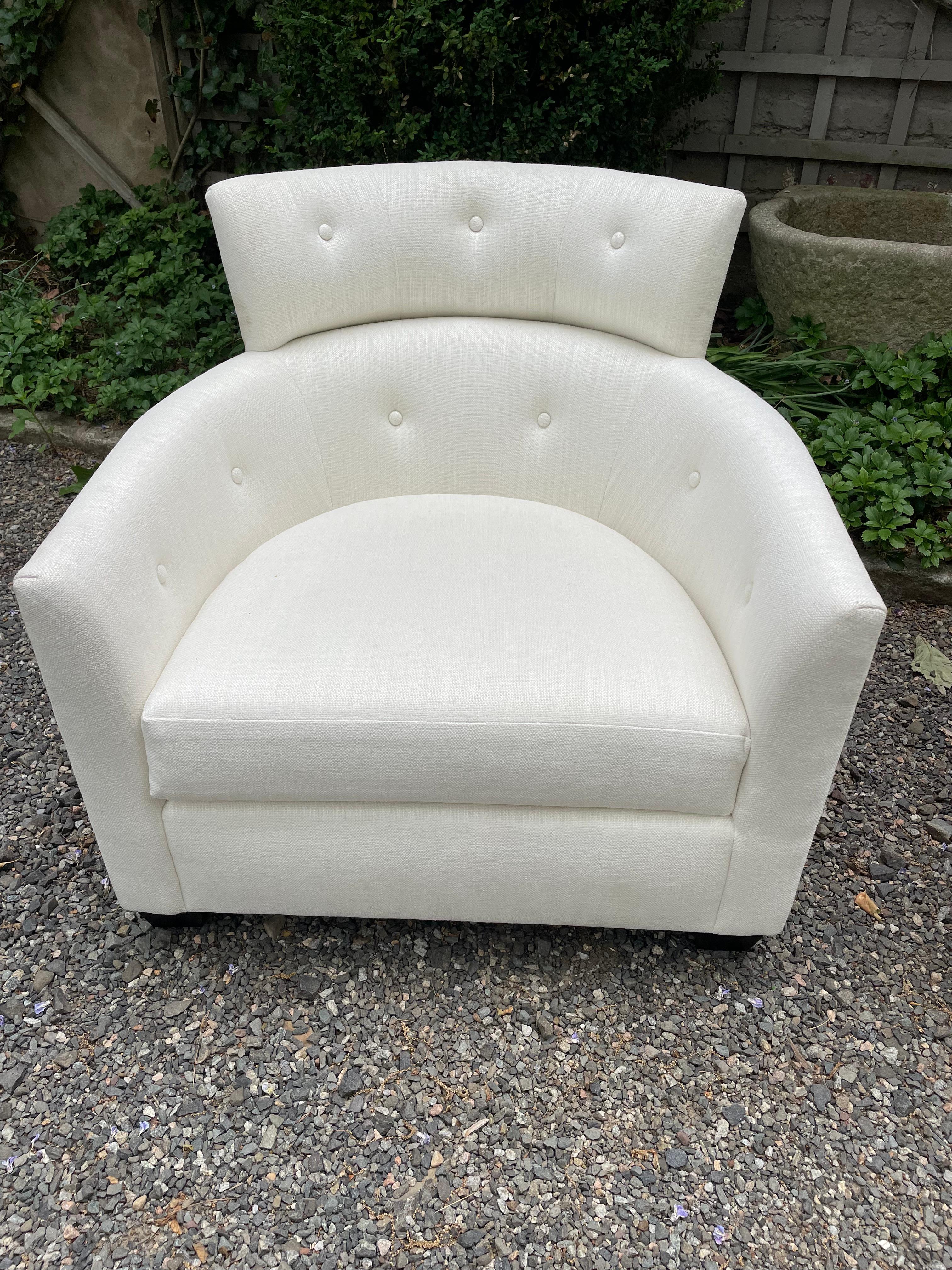 Super chic glamorous pair of barrel back curvy white club chairs upholstered in a cotton blend textured fabric. Very comfortable and stylish.