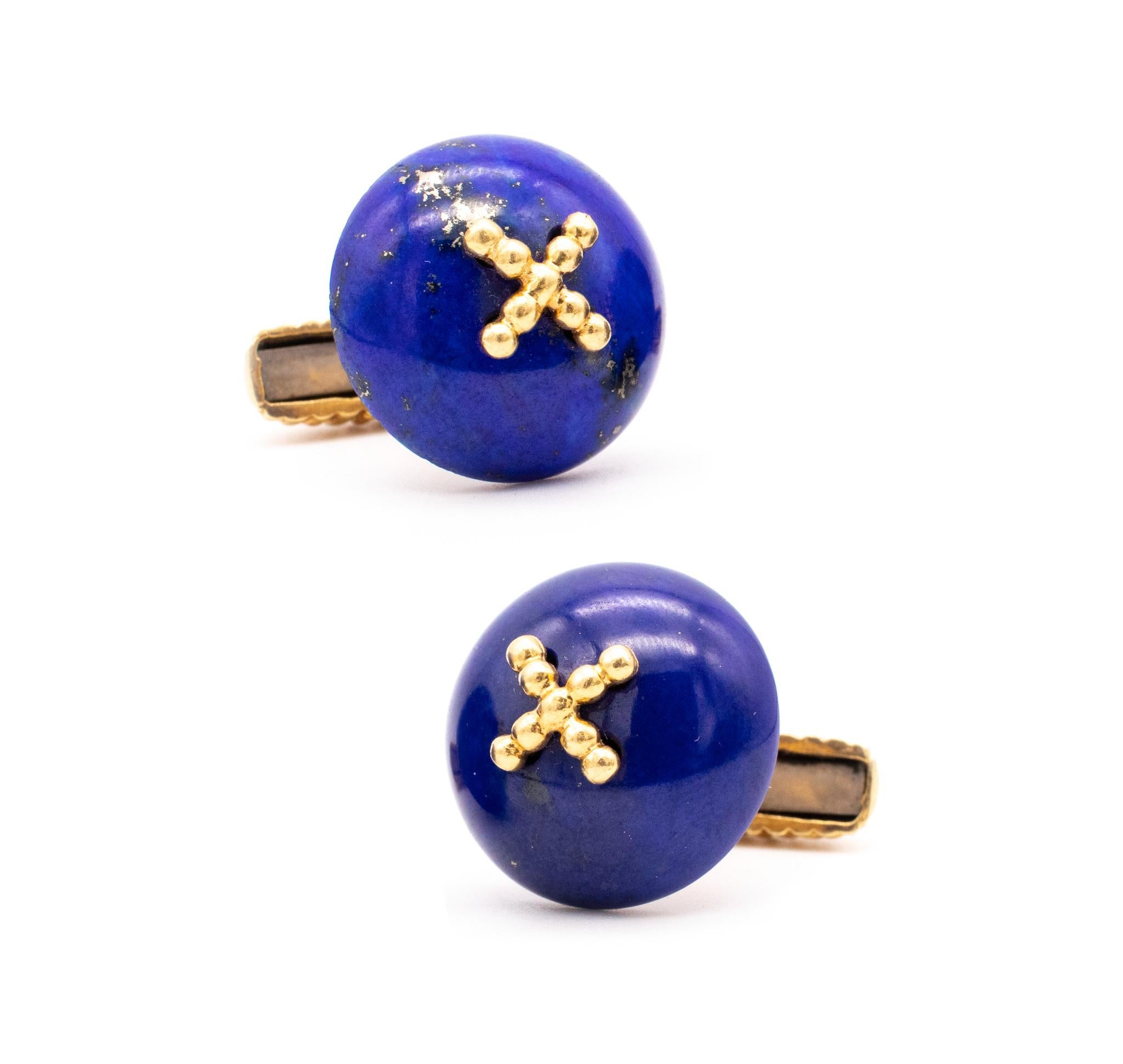 Great pair of European modern cufflinks.

An unique vintage pair of cufflinks made in Italy. They are hand crafted in solid 18 karats of textured yellow gold and suited with flexible hinged t bars.

The top part is embellished with two carved domed