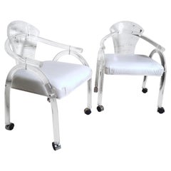 Vintage Modern Pair of Lucite Rolling Chairs