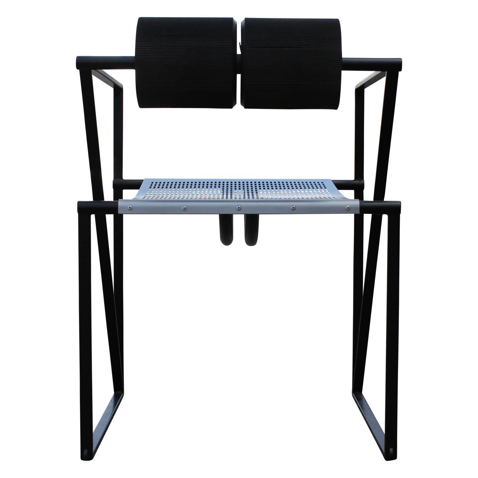 Chic modern pair of secunda memphis dining chairs. They are style 602 by Mario Botta for Alias.