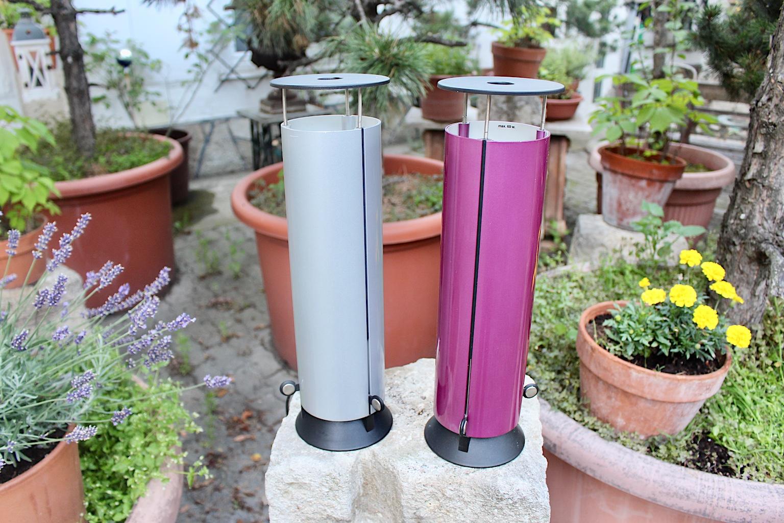 Modern pair of vintage plastic table lamps in the colors lilac, silver and black, which was designed by Paolo Cassai, Italy, 1980s.
This pair of table lamps Mod. Sax shows a stamp underneath: MOD. Sax des Paolo Cassai Made in Italy 220 V Divisione