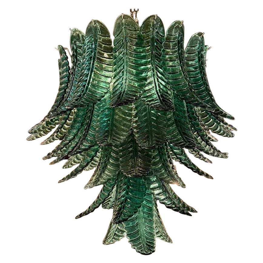 Moderna araña en cascada de cristal de Murano verde oscuro con hojas de palmera