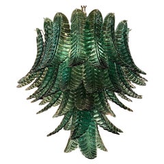 Moderna araña en cascada de cristal de Murano verde oscuro con hojas de palmera