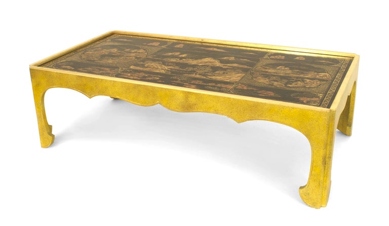 Asian Chinese-style rectangular coffee table with a black lacquered panel top featuring a Chinoiserie scene and modern celadon and gilt decorated shaped base.
    