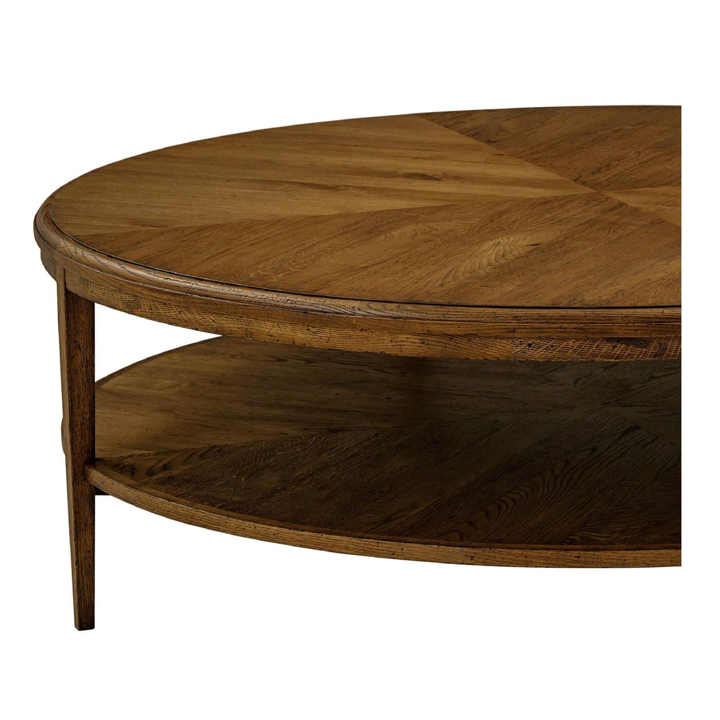 A modern dark oak parquetry round coffee table with a concentric oak sitting on a tapered oak leg. Finished in our dark oak Dusk finish.

Dimensions: 52