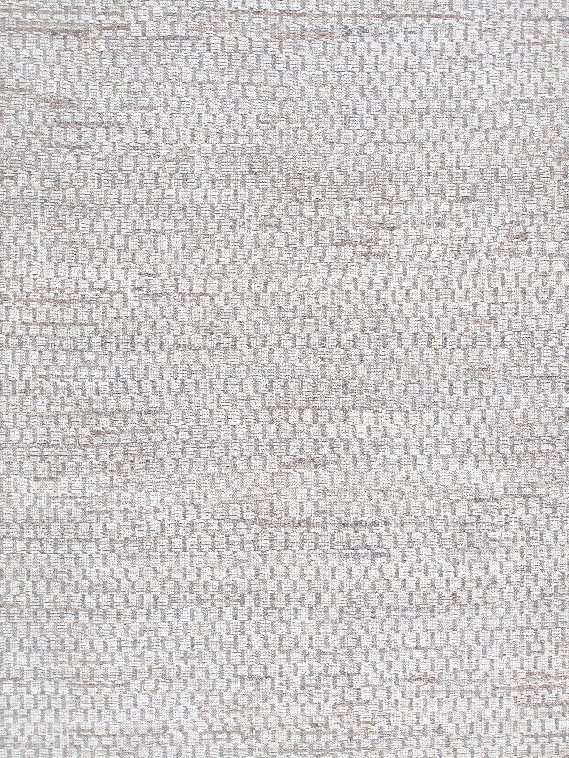 Our Pashmina rug is hand-knotted and made from the finest, hand-carded, hand-spun, natural wool. The combination of neutral tones along with its all-over textural design, makes this a perfect transitional, modern piece. Custom sizes and colors