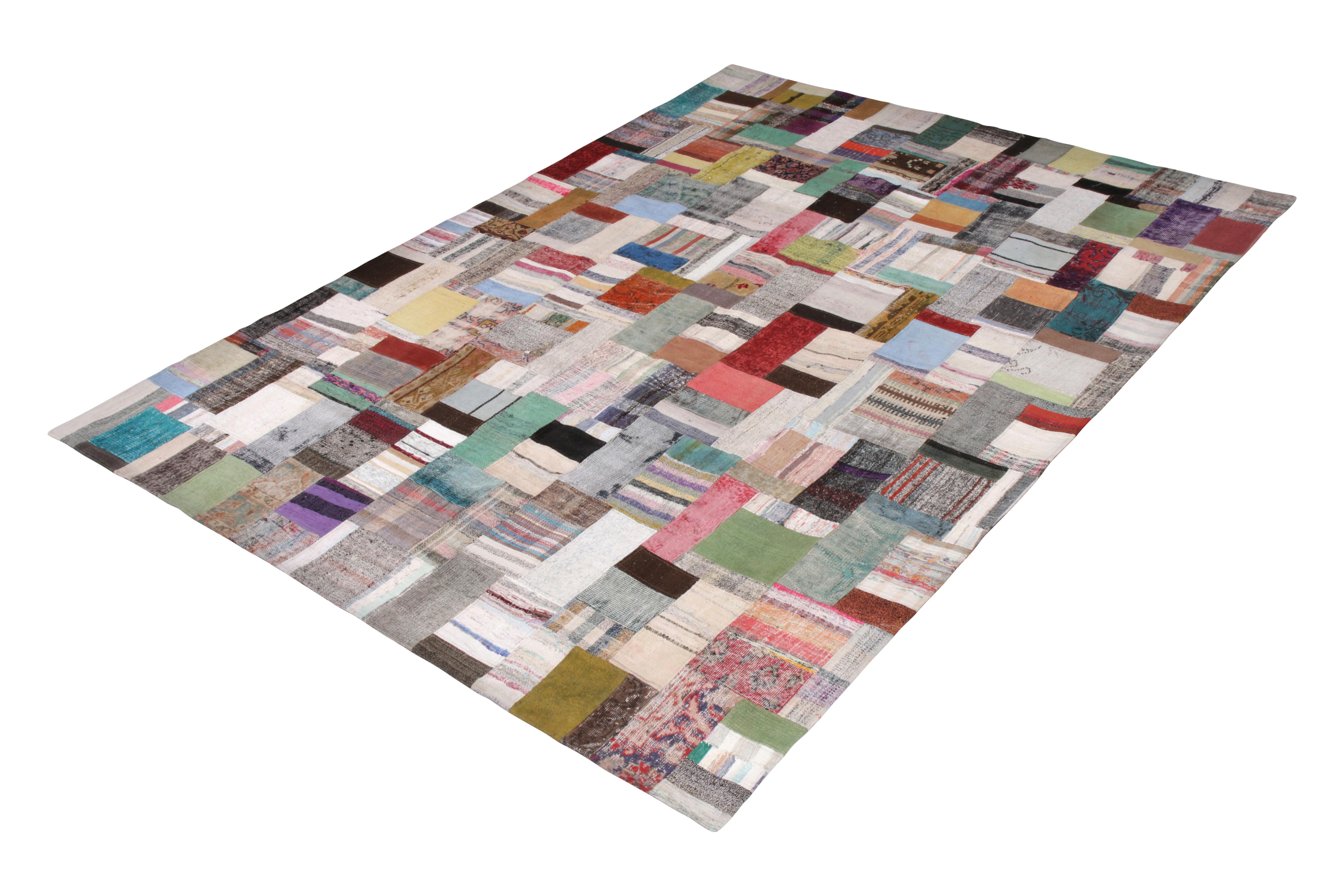 Handwoven in a wool flat-weave utilizing vintage yarns, this modern Kilim rug from Rug & Kilim’s Patchwork Kilim rug collection marries inspiration from midcentury Kilim rugs with a whimsical spectrum of red, blue, pink, green, and other colorways