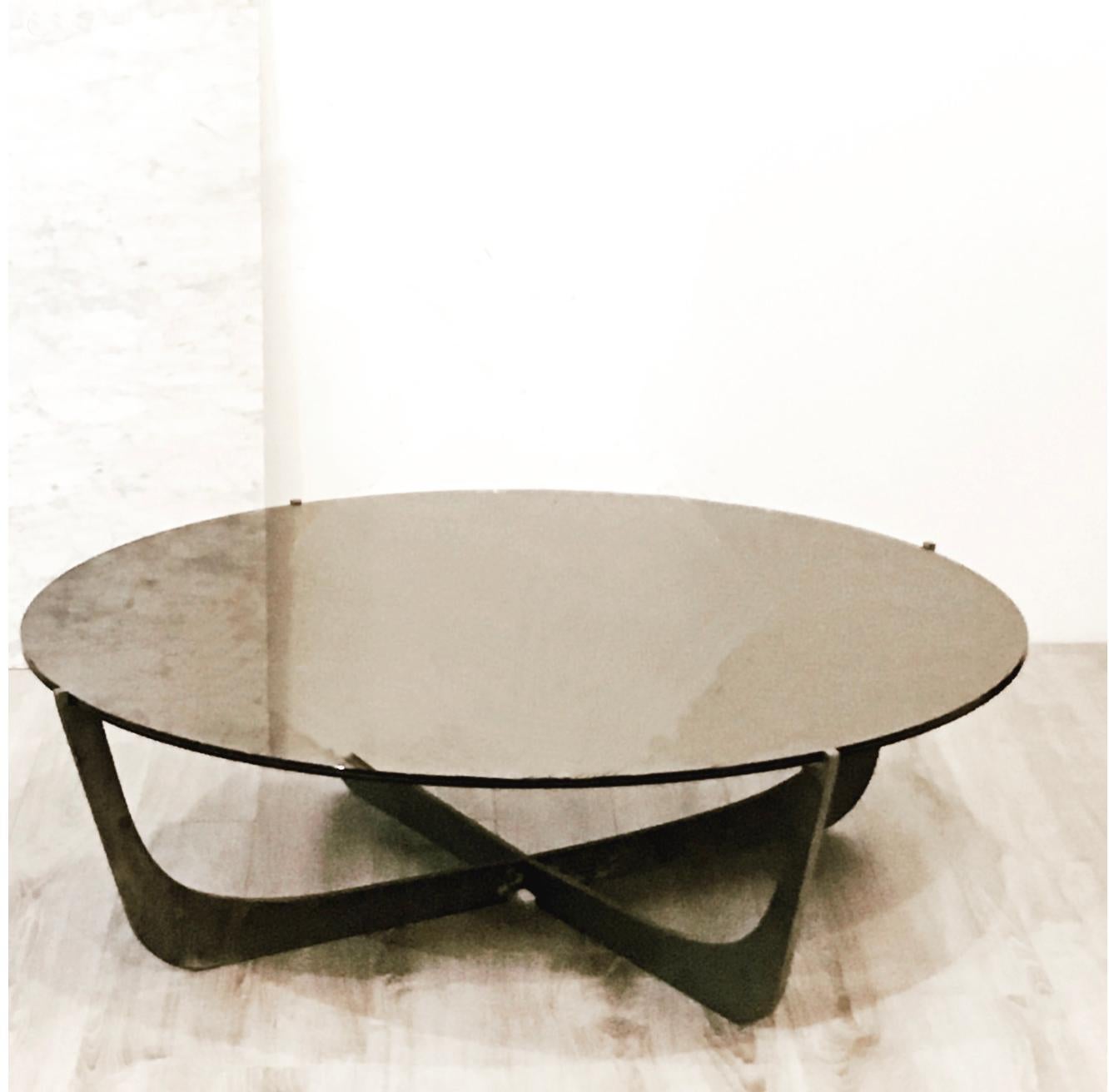 This steel and bronze glass coffee table is constructed of 1/4