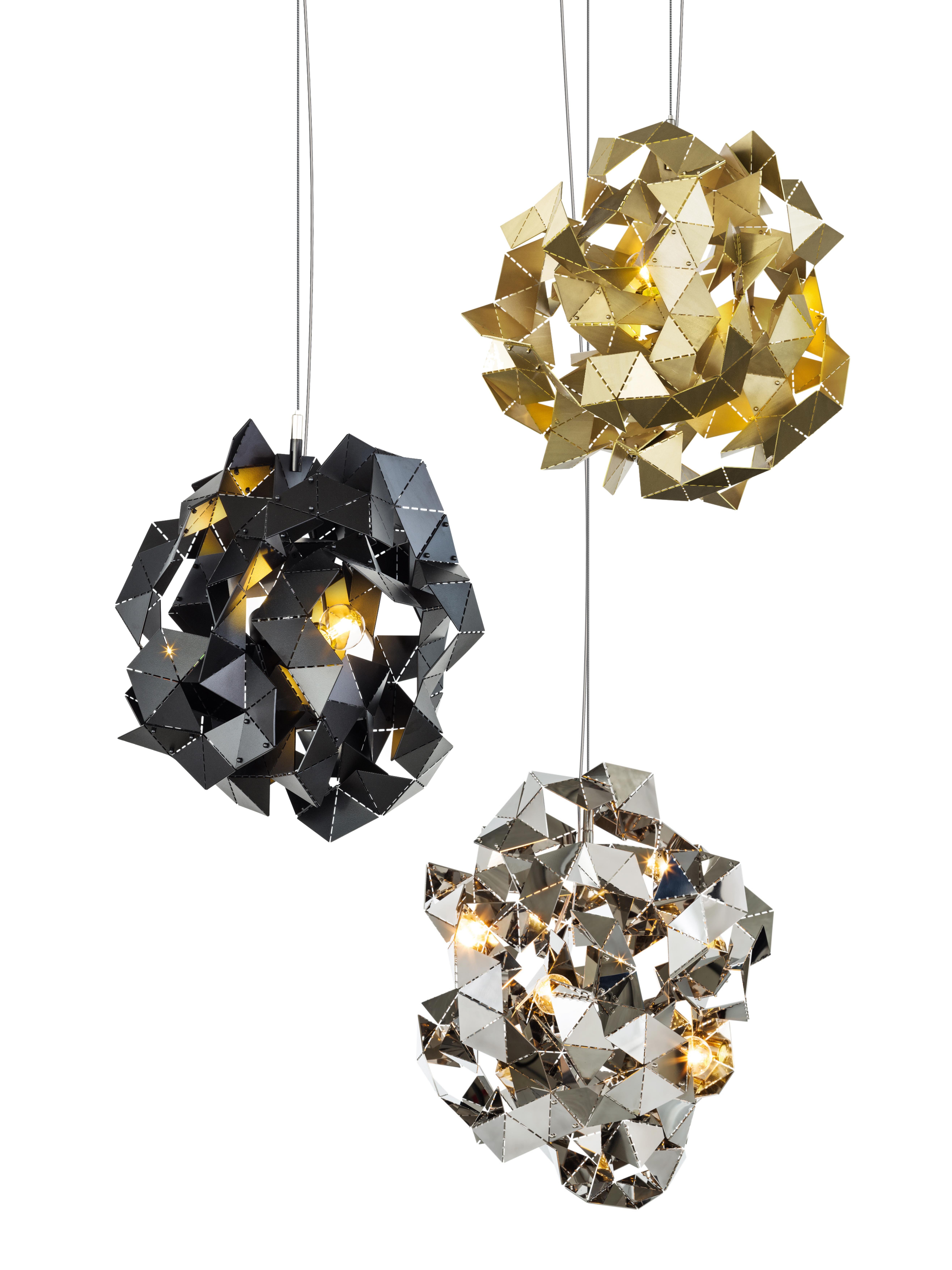 The Fractal Cloud, a modern pendant in black matt finish, is designed by William Brand, founder of Brand van Egmond. The play between the unexpected geometry of the surfaces and the characteristics of the metal changes the light from every point of