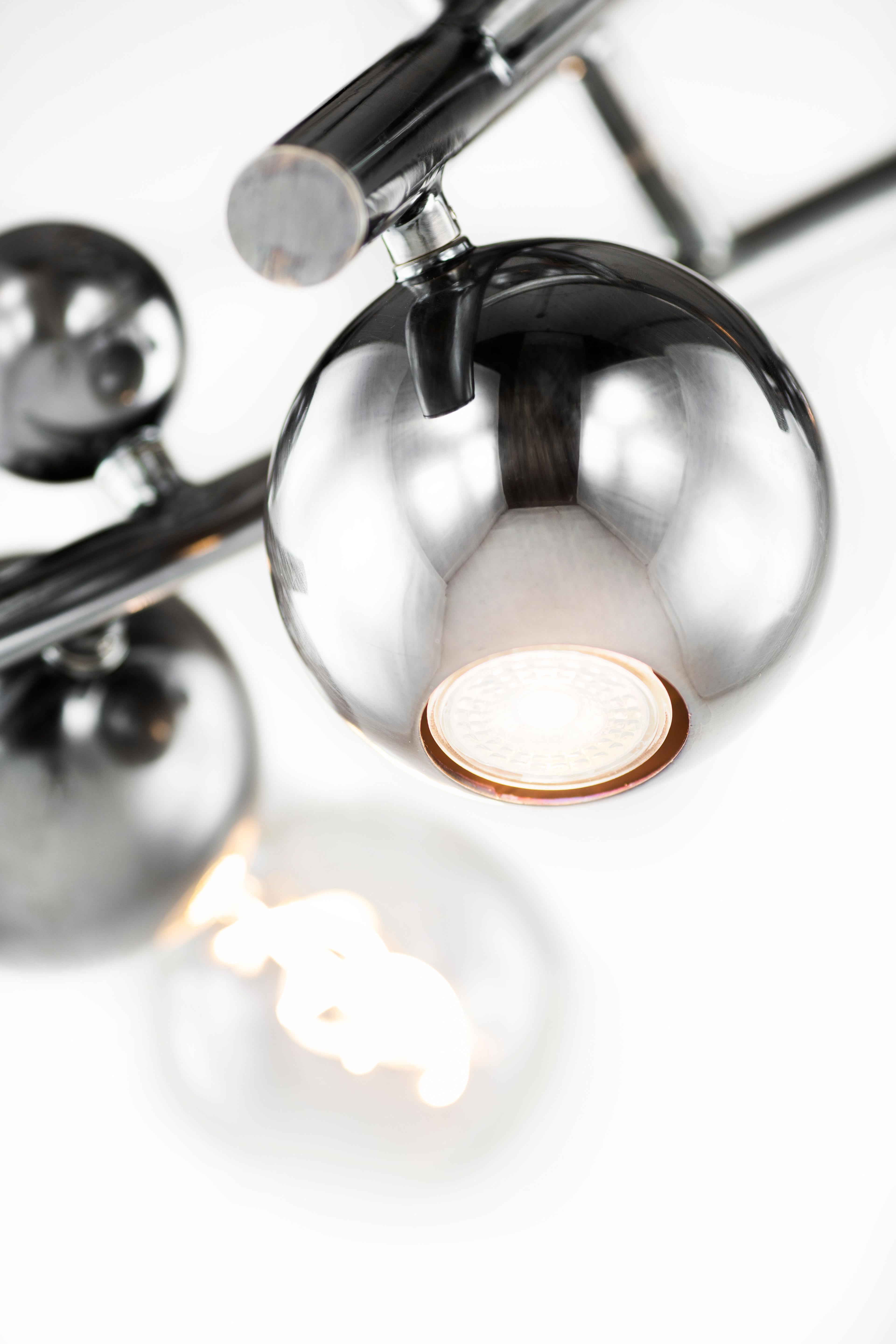 The Galaxy, a modern pendant in a nickel aged finish, is designed by William Brand, founder of Brand van Egmond. Created to bring character into any interior, the pendant is available in the finishes black matt, nickel, brass, brass burnished, and