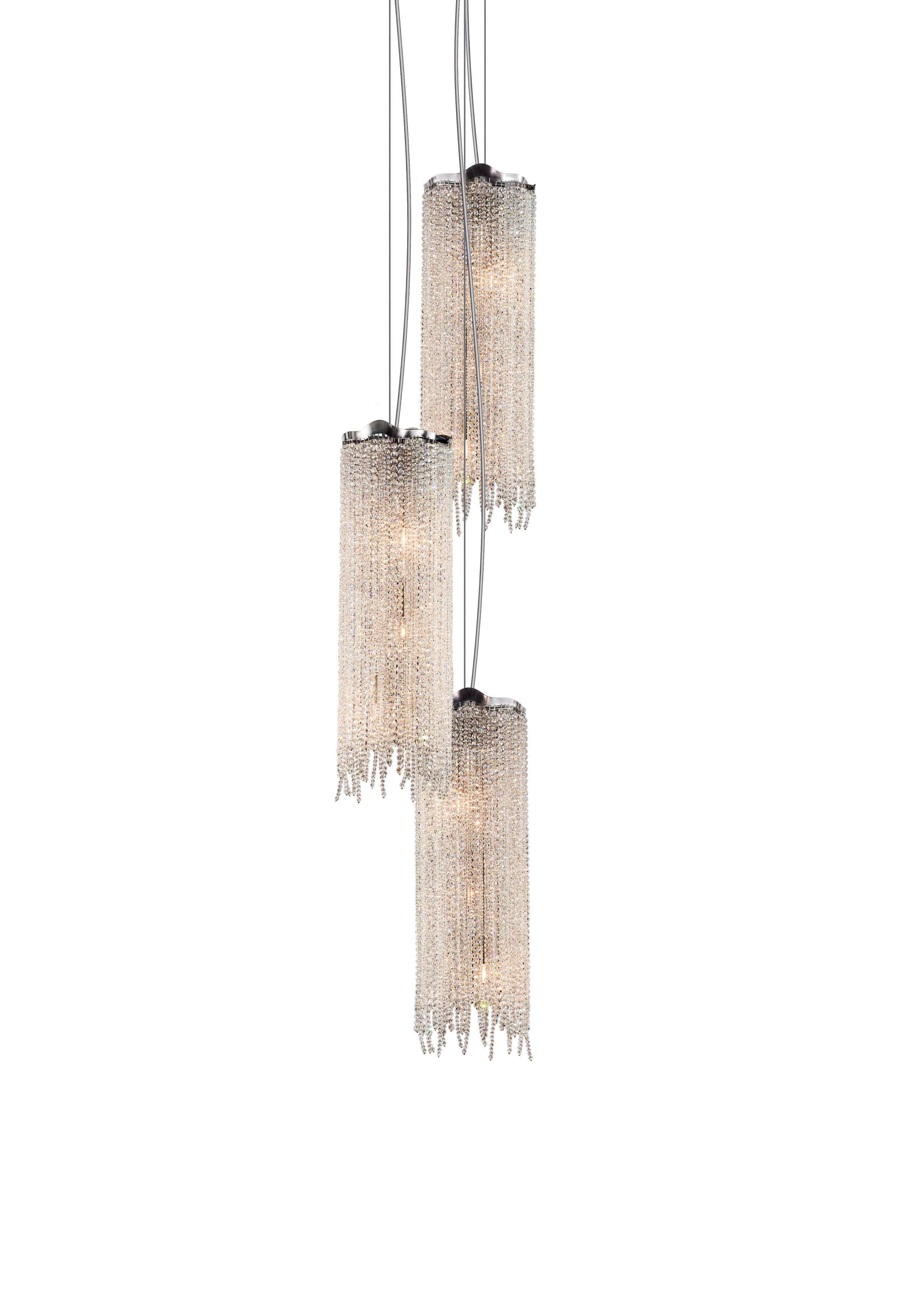 This modern pendant in a nickel finish with crystals is part of the Victoria collection, designed by William Brand of Brand van Egmond and can be used as a single lighting element or in a composition.

Before you see it, the sparkling light