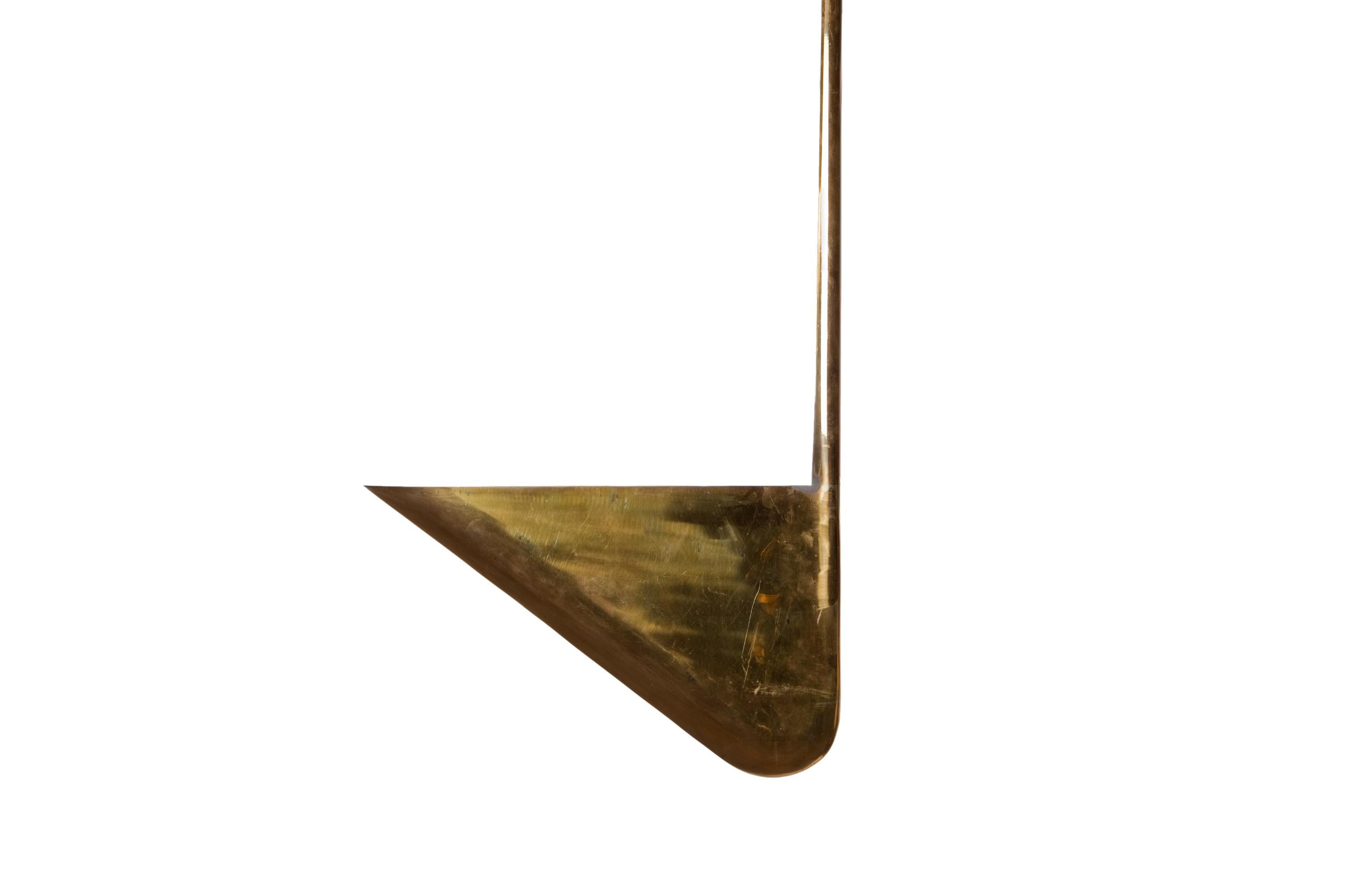 Pendant in brass uplighting led light.