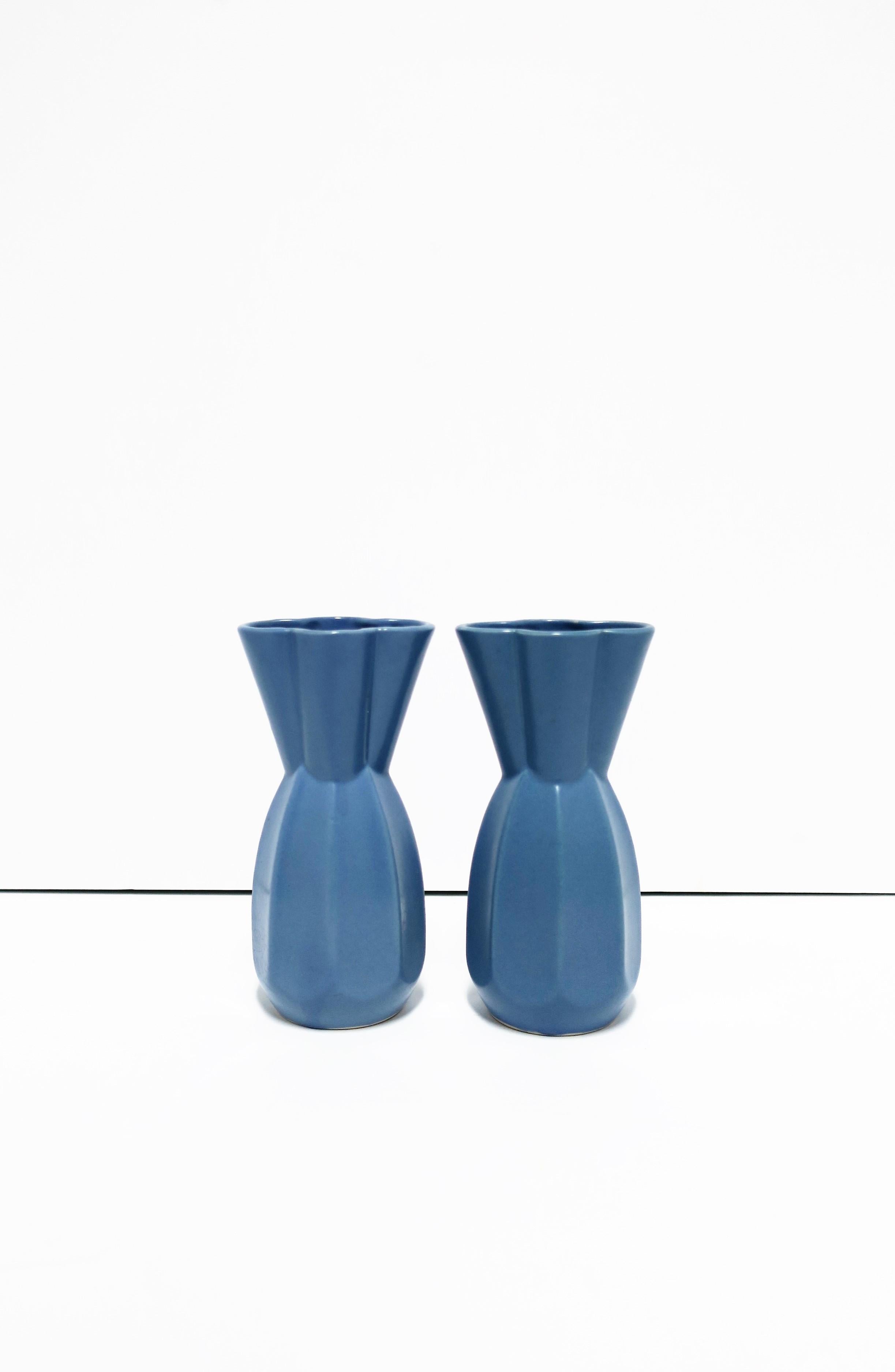 A beautiful pair of Modern periwinkle blue Japanese vases with octagonal base, pinched waist, and clover like design at neck/top. Marked underneath/bottom as show in image #15, circa early 20th century Japan, 1921-1941. Dimensions: 3.75